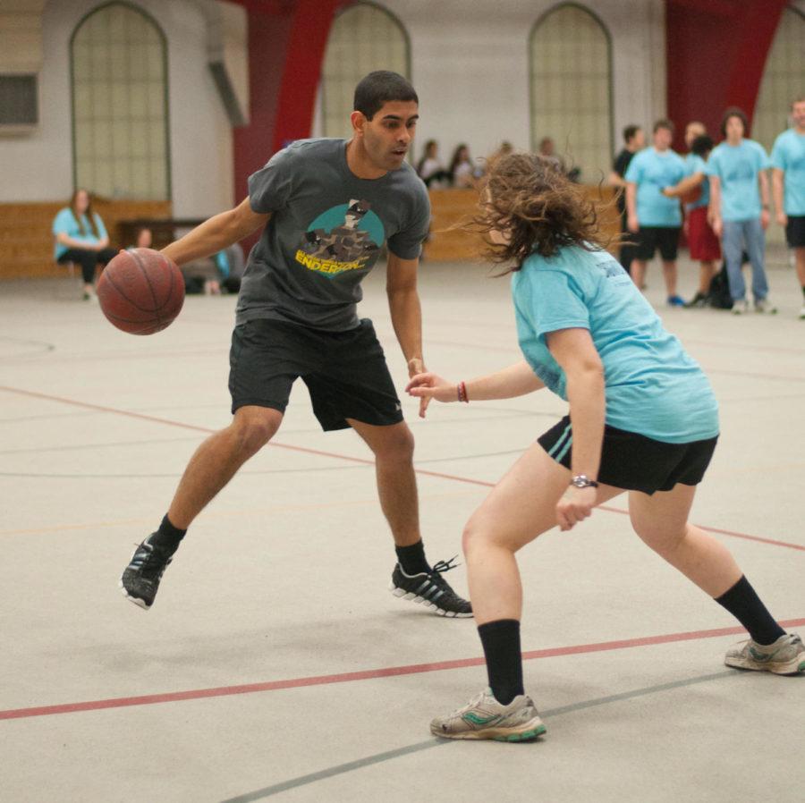 Henderson House faces off against Thompson House in basketball. 