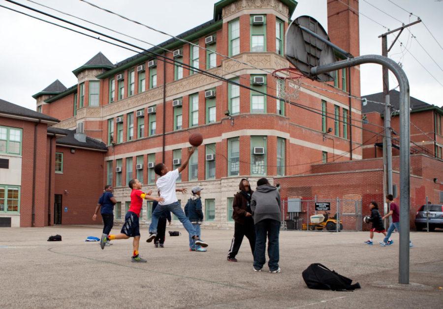 Students from Ray Elementary School play pick-up basketball after school.  Due to Chicago Public School closings in the upcoming months, Ray will gain students from Canter Middle School.