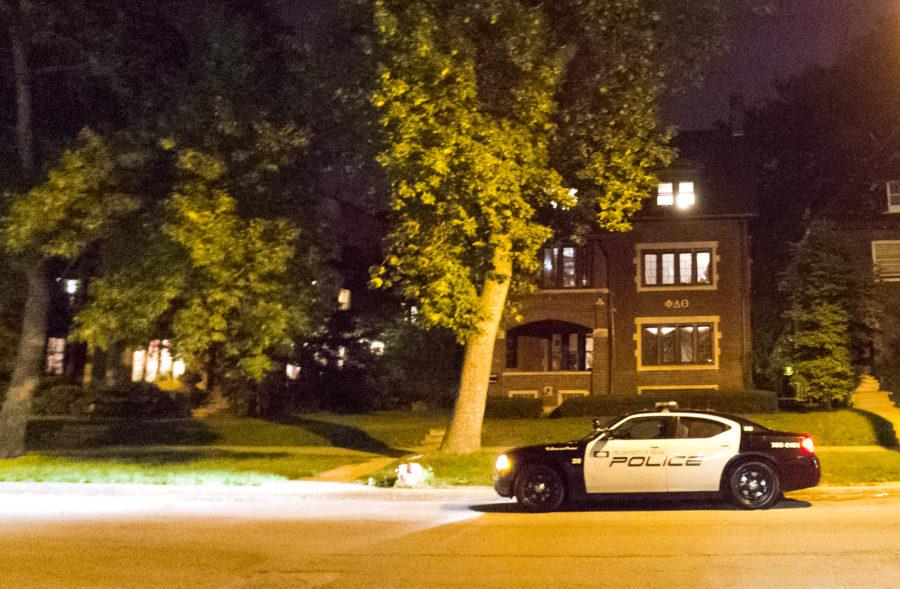 A+UCPD+squad+car+sits+outside+of+Phi+Delta+Theta+Thursday+evening+after+the+fraternity+received+a+bomb+threat.+The+fraternity+says+that+it+is+the+victim+of+an+anti-gay+and+racist+prank.