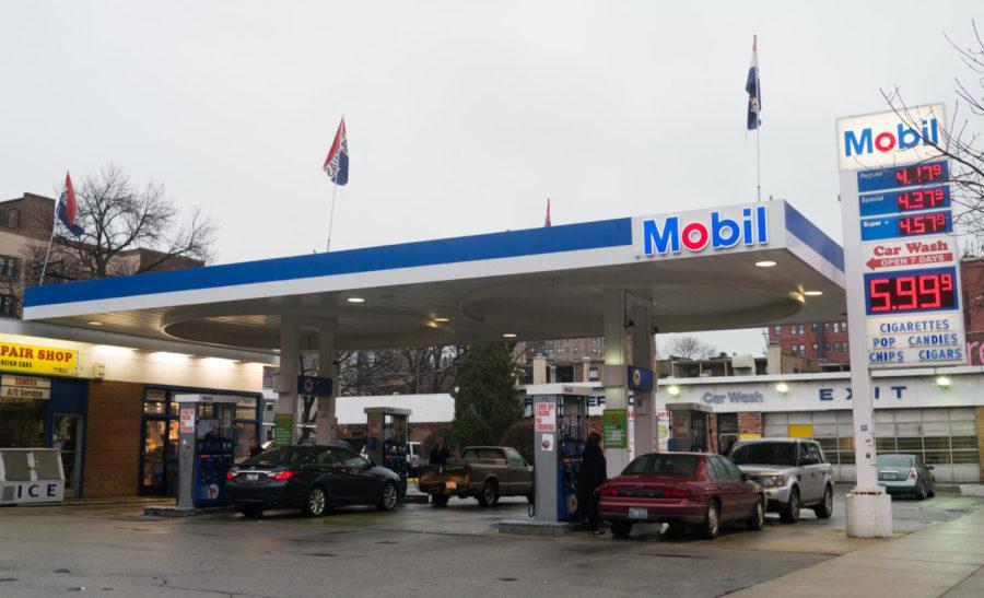 Residents of 53rd Street are suing the city because of zoning changes that will allow a high-rise to be built at the site of the Mobil station.