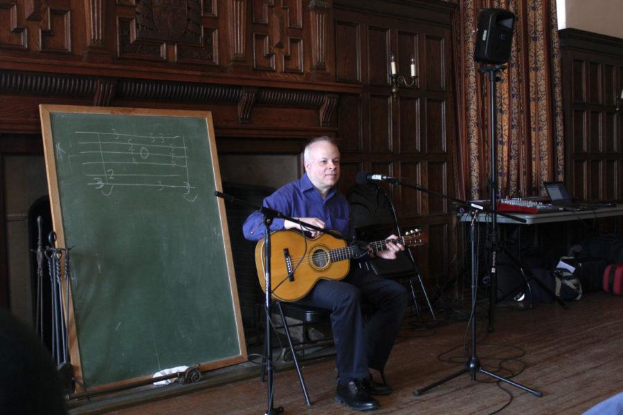 Ari Eisinger leads a workshop on the guitar style of blues musician Blind Blake.