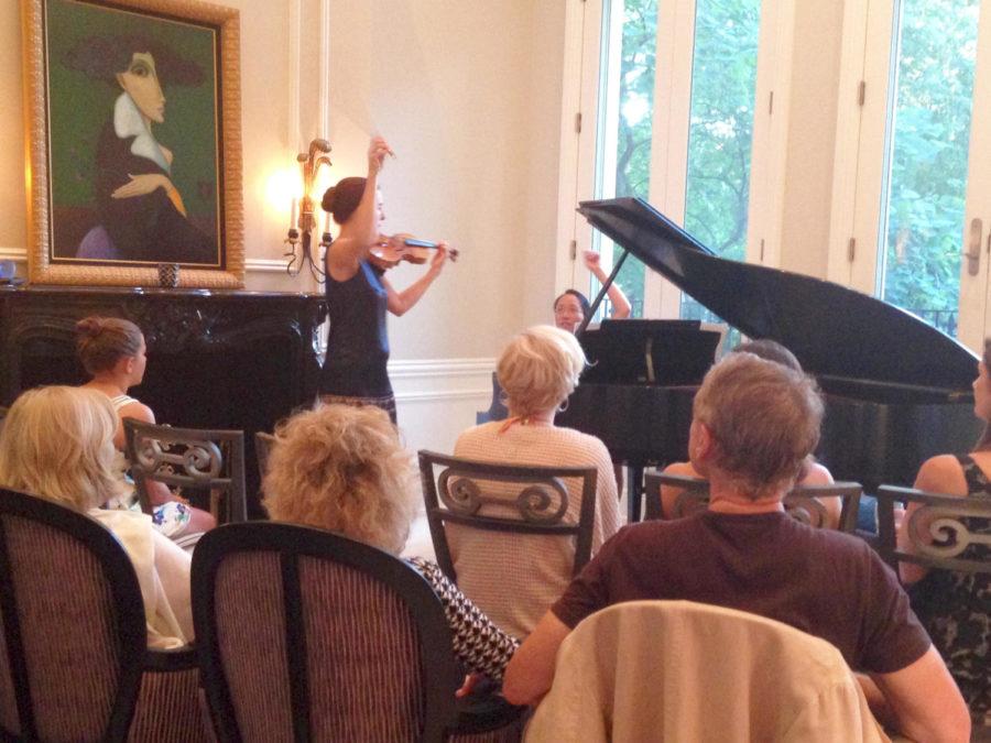 Alison Dalton at her solo recital this summer, accompanied by Eugenia Cheng, a math lecturer at the University of Chicago.