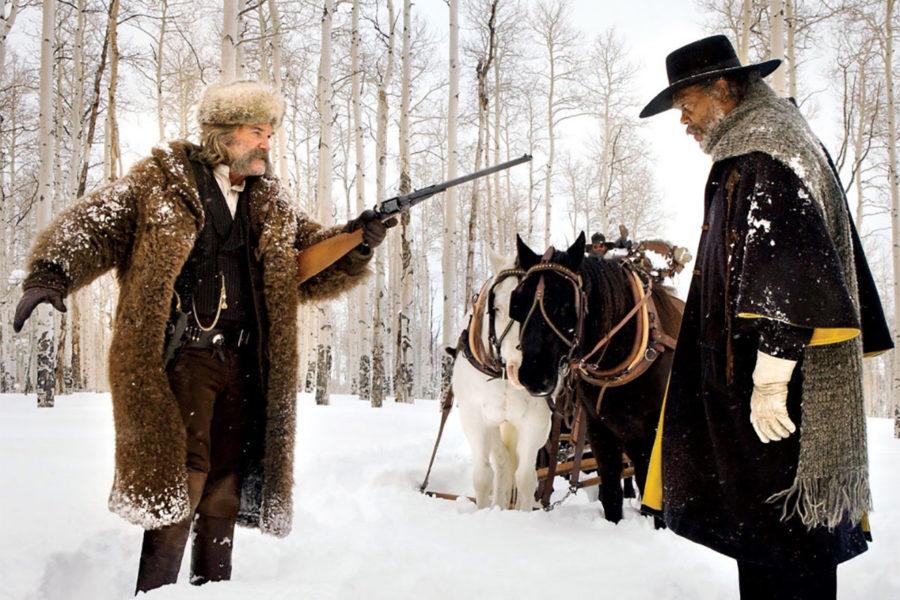 John Ruth (Kurt Russell) and Major Warren (Samuel L. Jackson) share a tense moment in the snow.