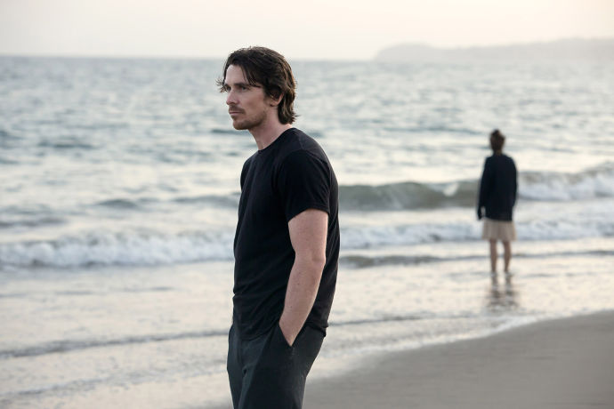 Rick (Christian Bale) is at the foreground of Malick’s latest landscape.