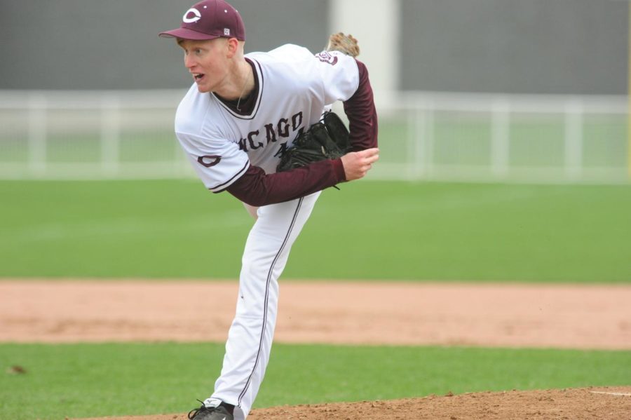 Fourth-year  Nick Watson pitches in a game against Edgewood College last year.