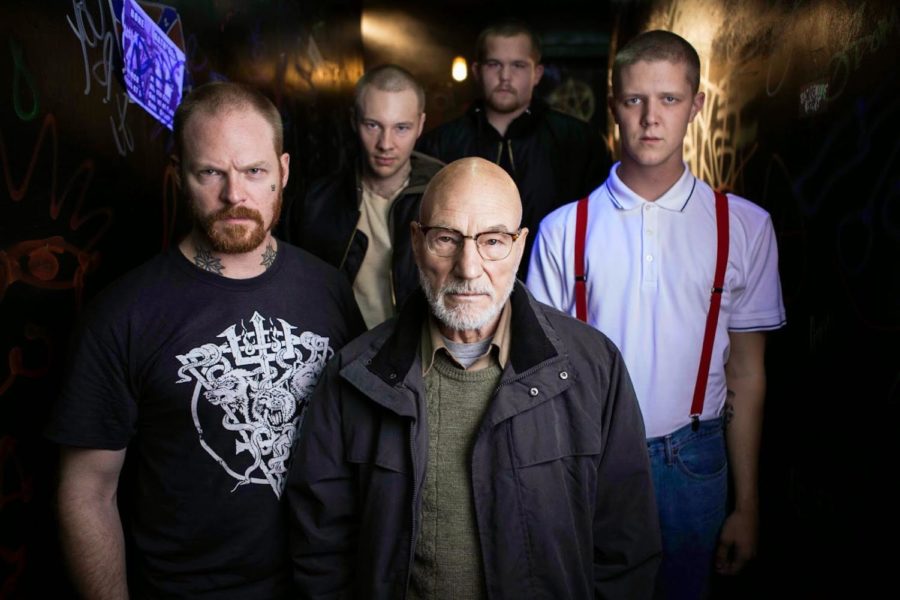Patrick Stewart (center) leads an antagonistic group of neo-Nazi thugs in director Jeremy Saulnier’s Green Room.