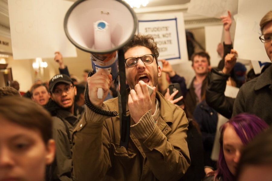 Alex Peltz, a second-year organizer with Students for Disability Justice, protests at the Chicago Symphony Orchestra.