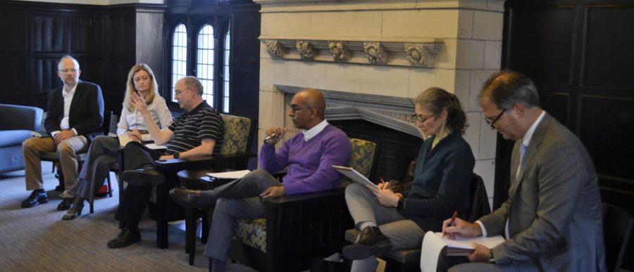 Members of the Committee on University Discipline for Disruptive Conduct (from left to right), Christopher Wild, Michele Rasmussen, Randal Picker, and Daniel Abebe, hold a forum on the issue of disruptive conduct on Oct. 13th.