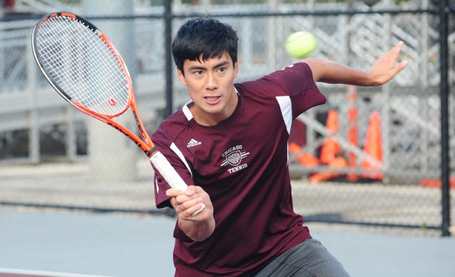 Third-year Peter Leung connects with a volley.