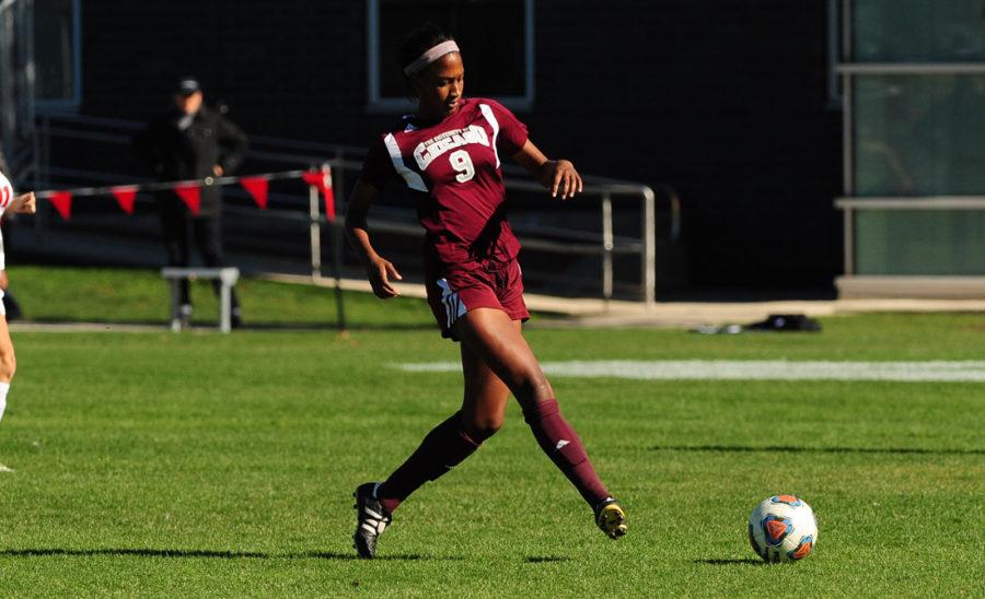 Third-year defender Kaitlin Price passes a ball up the field.