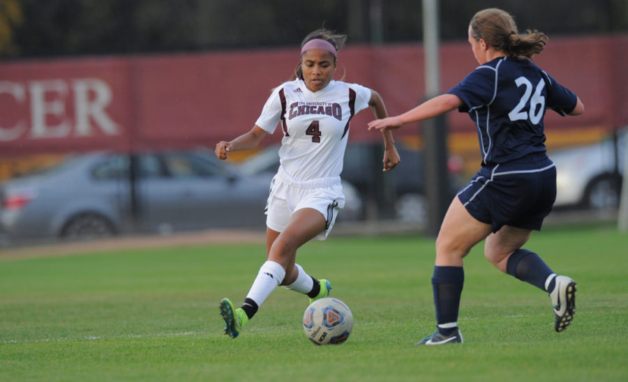 Second-year defender Sydney Mathis runs the ball past a defender.