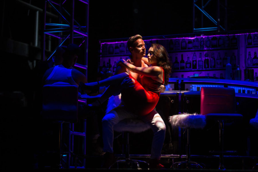 Lysander (Ryan Belongie) and Helena (Alexandra Martinez) share an intimate embrace.