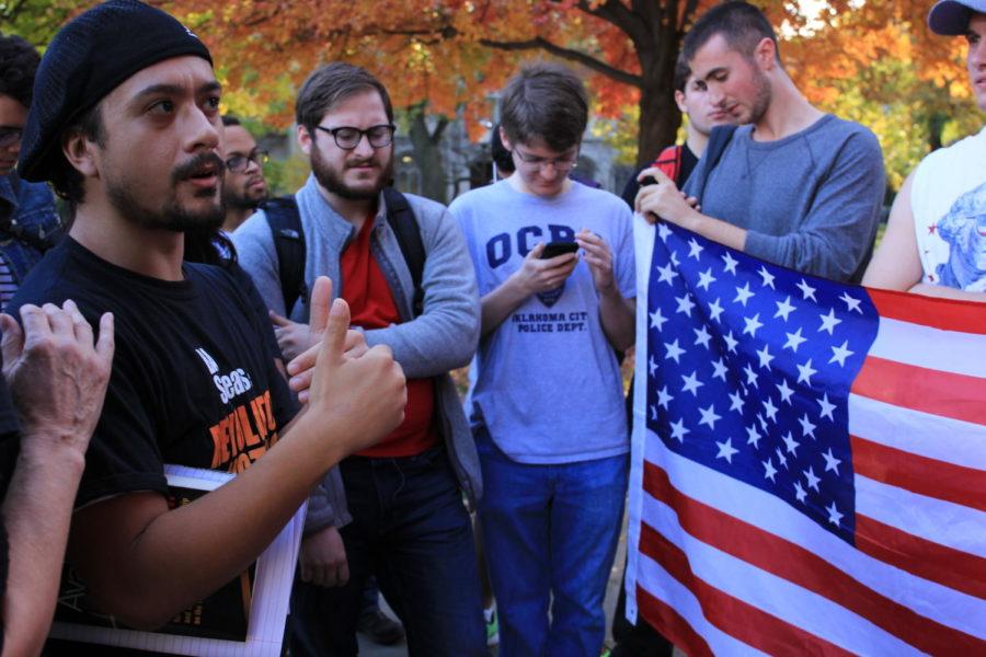 Students brought an American flag to Diazs protest.