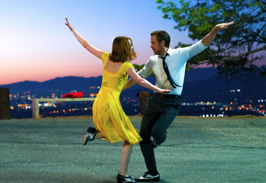 Mia (Emma Stone) and Sebastian (Ryan Gosling) dance in a scene from La La Land.