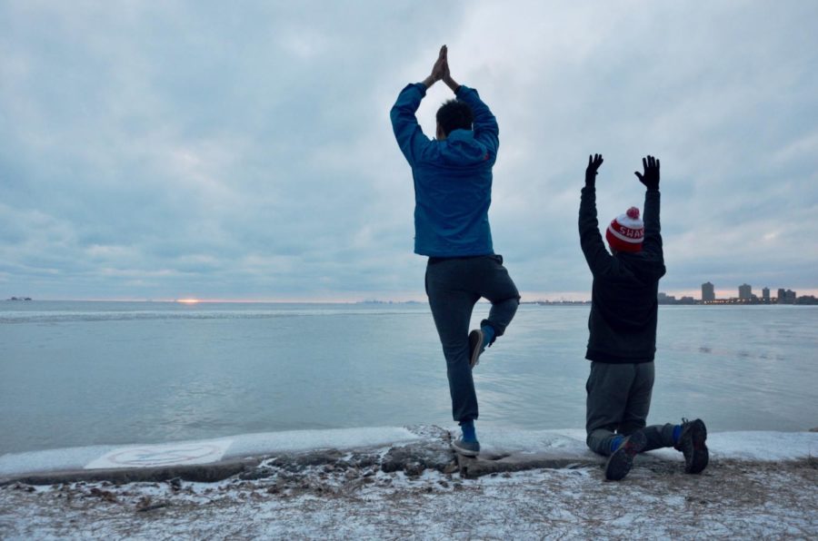 Students brave the cold and perform their final sun salutations as a new day dawns.