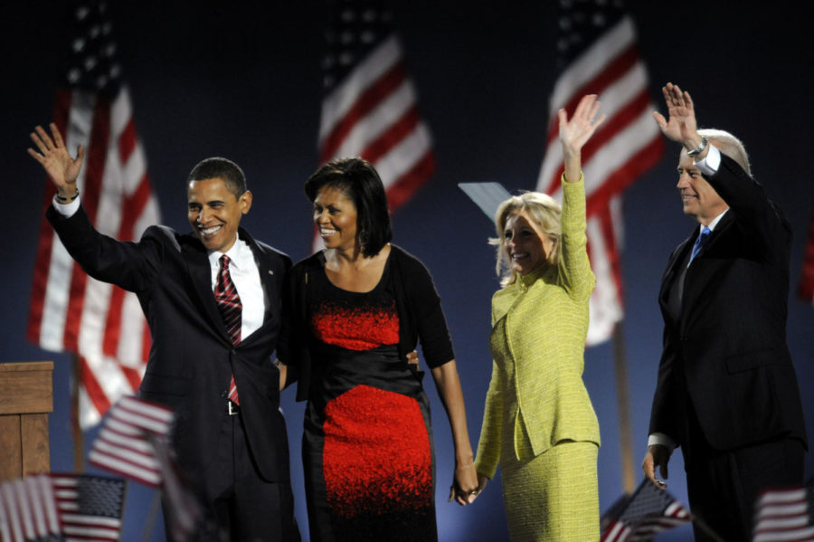 Barack and Michelle Obama and Joe and Jill Biden wave to the crowd at Chicago's Grant Park on election night in 2008.