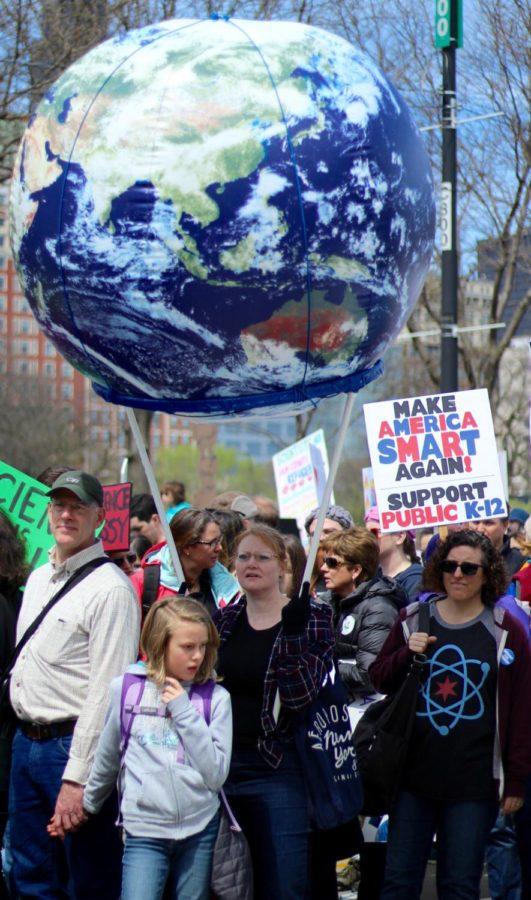 Marchers+showed+support+for+science-based+political+policy%2C+action+on+global+warming%2C+and+funding+for+clinical+trials.