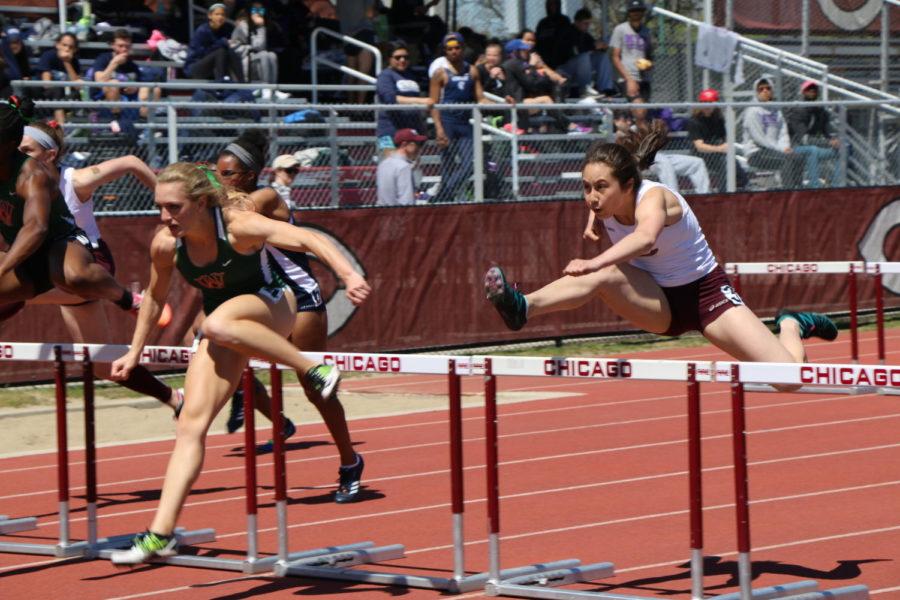 First-year Robin Peter races in the 100-meter hurdles.