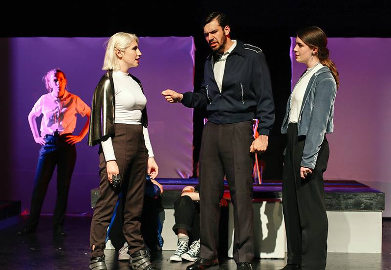 Lear+%28first-year+Thomas+Noriega%2C+center%29+confronts+his+daughters+Regan+%28third-year+Peyton+Walker%2C+left%29+and+Goneril+%28fourth-year+Michaela+Voit%2C+right%29.