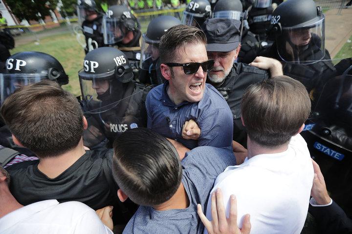 White+nationalist+Richard+Spencer+and+his+supporters+clash+with+Virginia+State+Police.