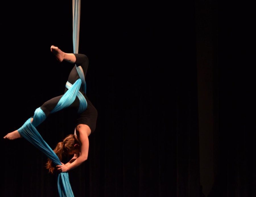 Fourth-year Cecilia Boyers performs on silks for Le Vorris & Voxs annual winter showcase.