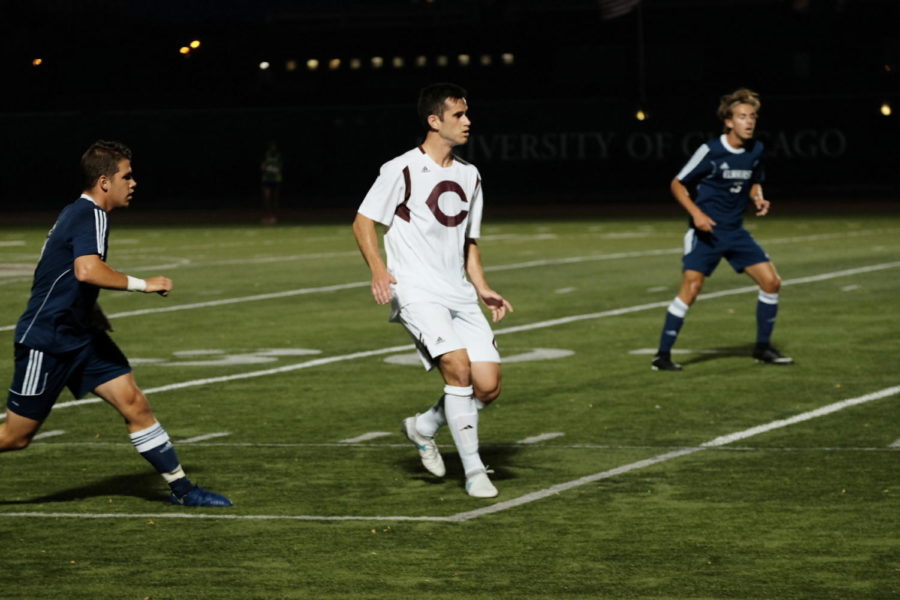 Fourth-year Andre Abedian races up the field shadowed by defenders.
