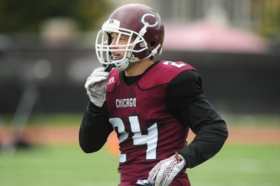 Third-year Henry Imburgia observes the field and prepares for the next play.