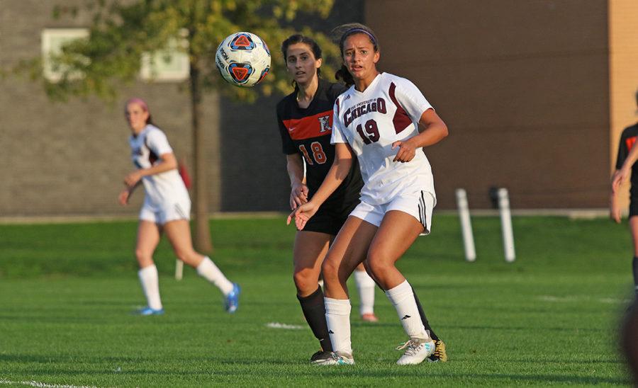 Second-year Julia Lodoen anticipates the ball as she stands directly next to her defender.