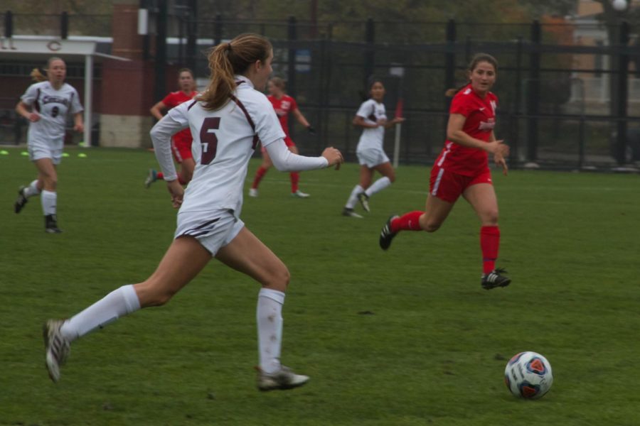 Second-year Clare Suter dribbles through the opposing defense.