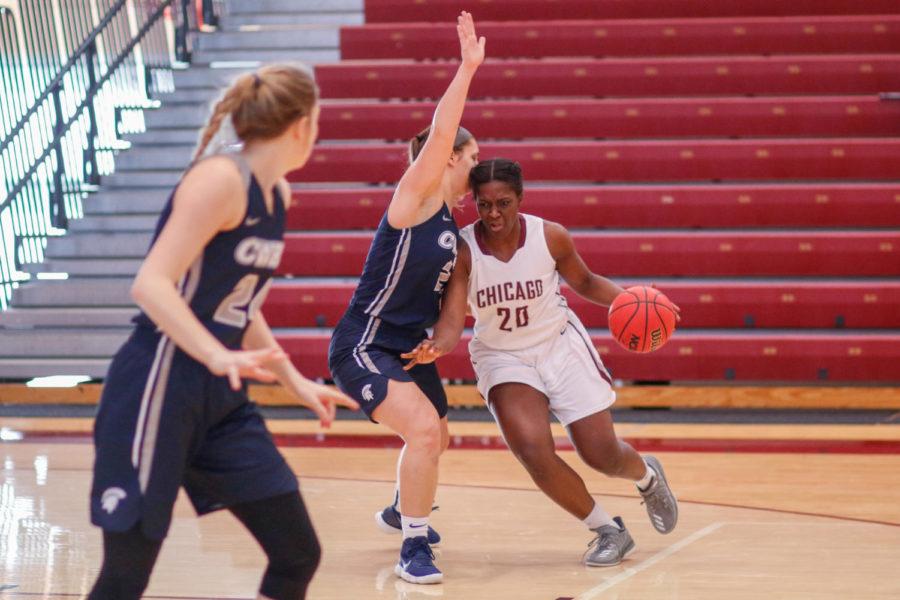 Third-year Olariche Obi brings the ball into the paint against Case Western
