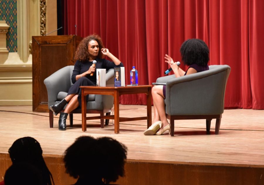 Janet Mock speaks at Mandel Hall on Thursday to share her story as a Black trans woman with fourth year Darien Dey.