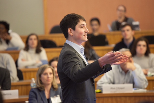 A student speaks at the College New Venture Challenge (CNVC)