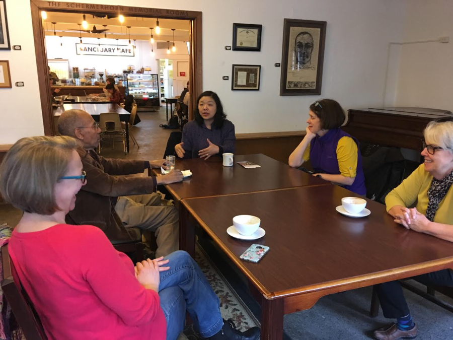 Grace Chan McKibben, a candidate for the 25th district house seat, conducts a meet-and-greet in Sanctuary Cafe.