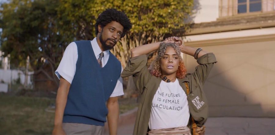 Lakeith Stansfield (Cassius Cash Green) and Tessa Thompson (Detroit) play an engaged couple in this satire on capitalist America