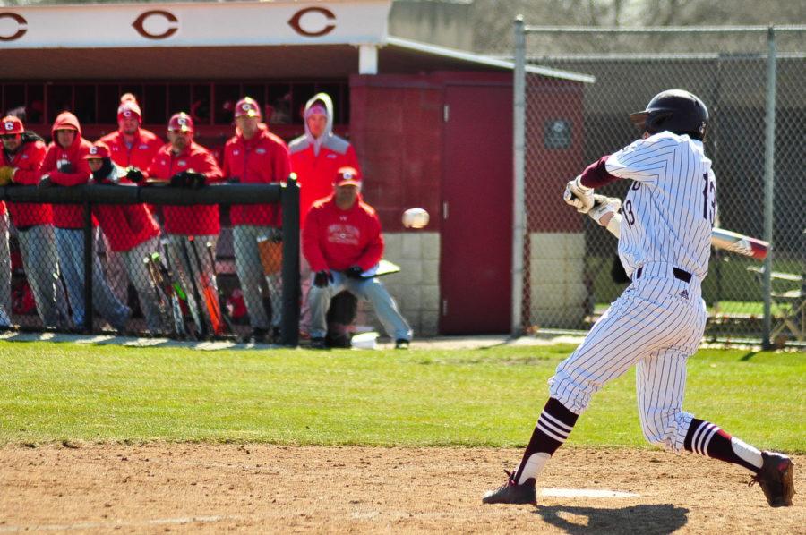 First-year James Kelly swings at a pitch.