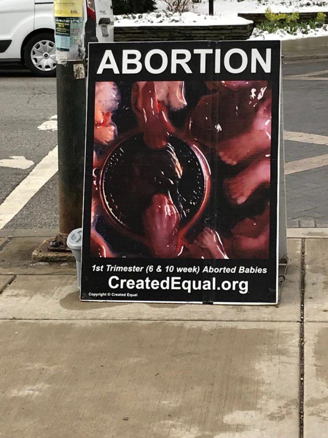 An+anti-abortion+poster+displayed+outside+the+Regenstein.