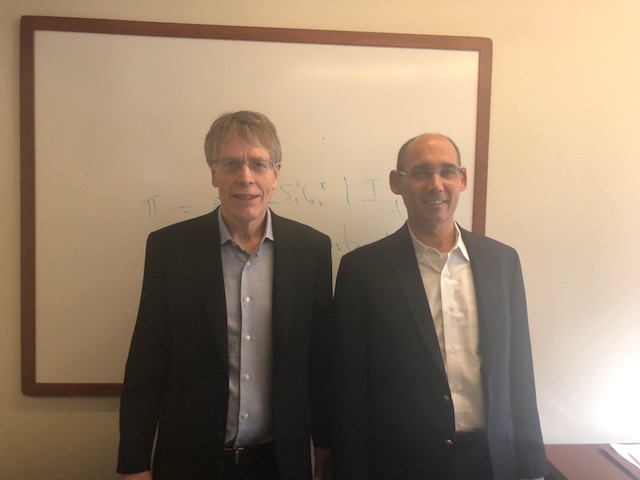 From left: Dr. Lars Hansen, a winner of the 2013 Nobel Prize in Economics, and his doctoral student Dr. Amir Yaron MA1992, PhD94, who was just nominated to lead the Bank of Israel.