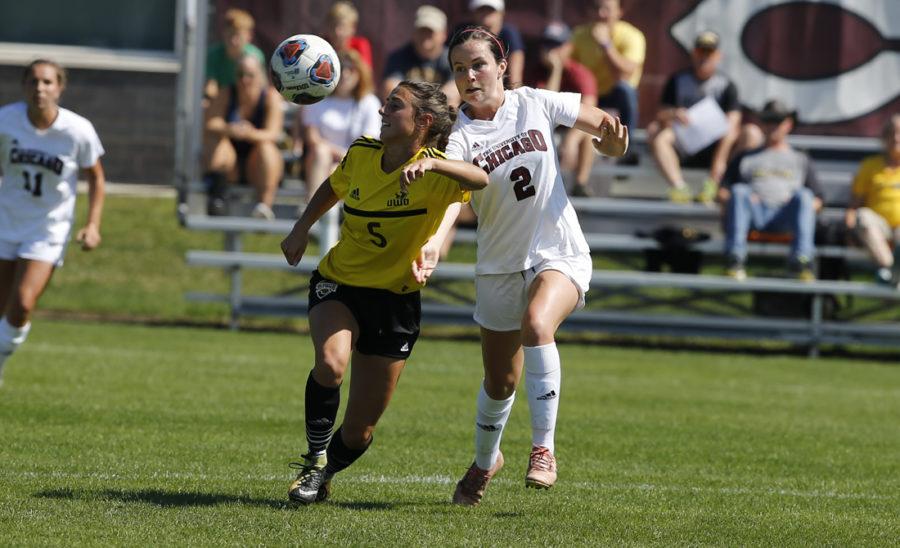 Third-year Hanna Watkins battles a defender for possession of the ball.