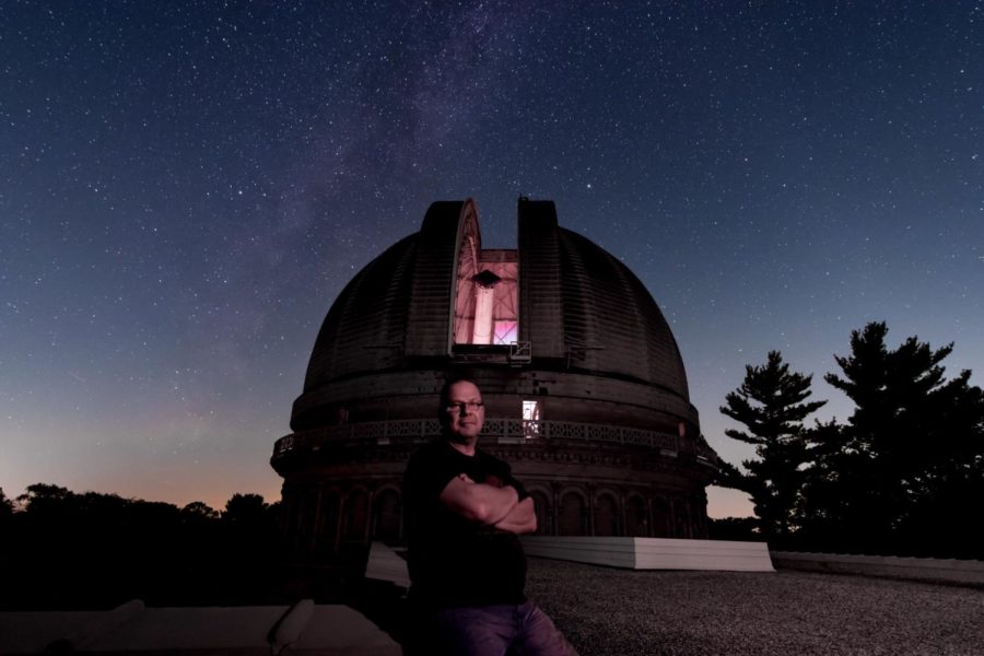 Dan+Koehler+stands+in+front+of+the+observatorys+main+refractor+telescope+dome.