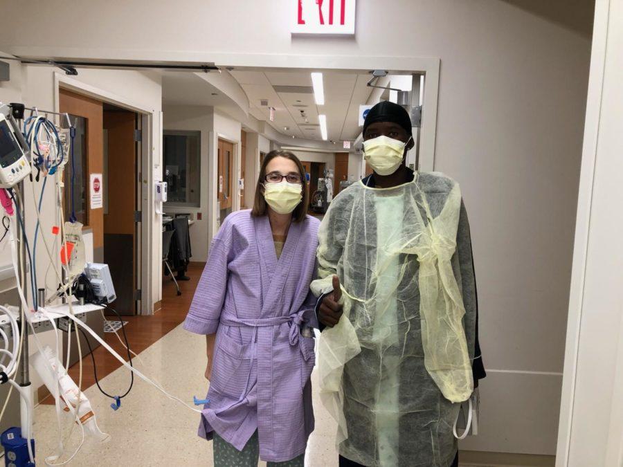 Sarah McPharlin and Daru Smith walking together while recovering from their transplants. Courtesy of the McPharlin family and UChicago Medicine.
