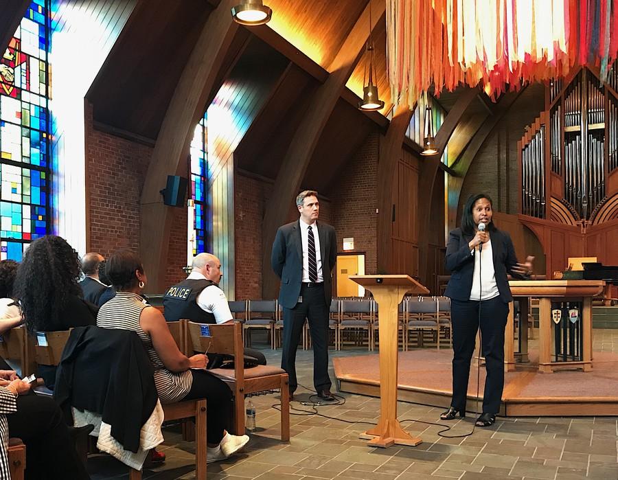 Fourth Ward Alderman Sophia King, right, speaks with Eric Heath, UChicagos Associate Vice President of Safety & Security, at a community meeting last May