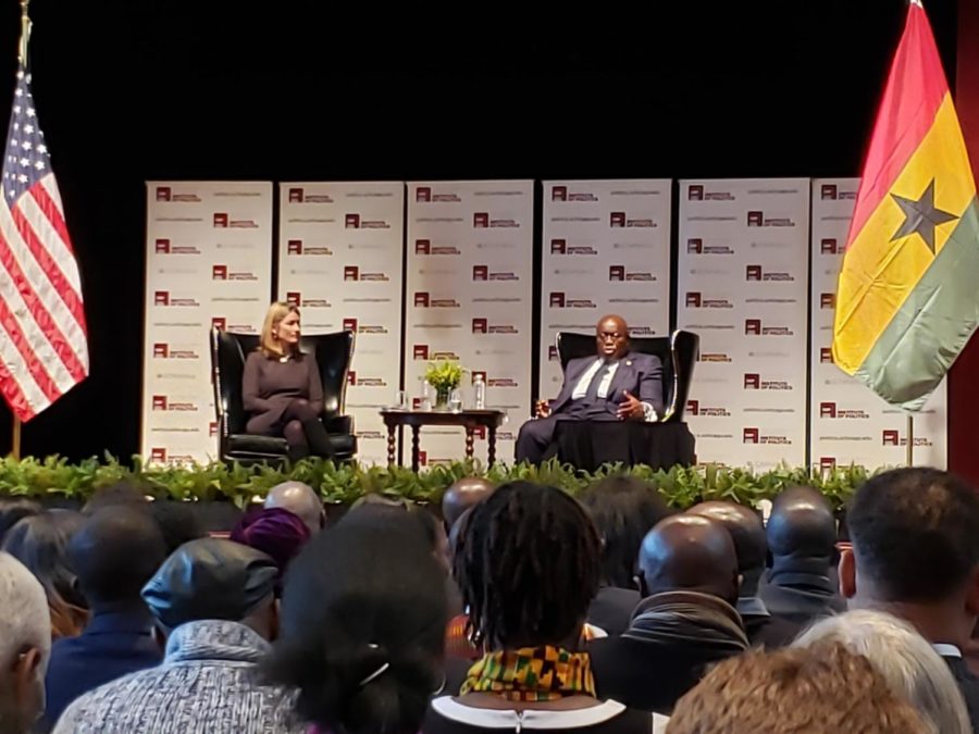 Ghana President Nana Akufo-Addo answering questions from attendees, sitting alongside IOP executive director Gretchen Crosby-Sims.