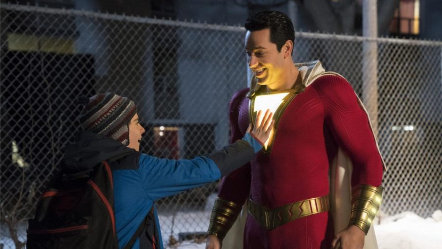 Jack Dylan Grazer as Freddie and Zachary Levi as the adult Billy in Shazam!