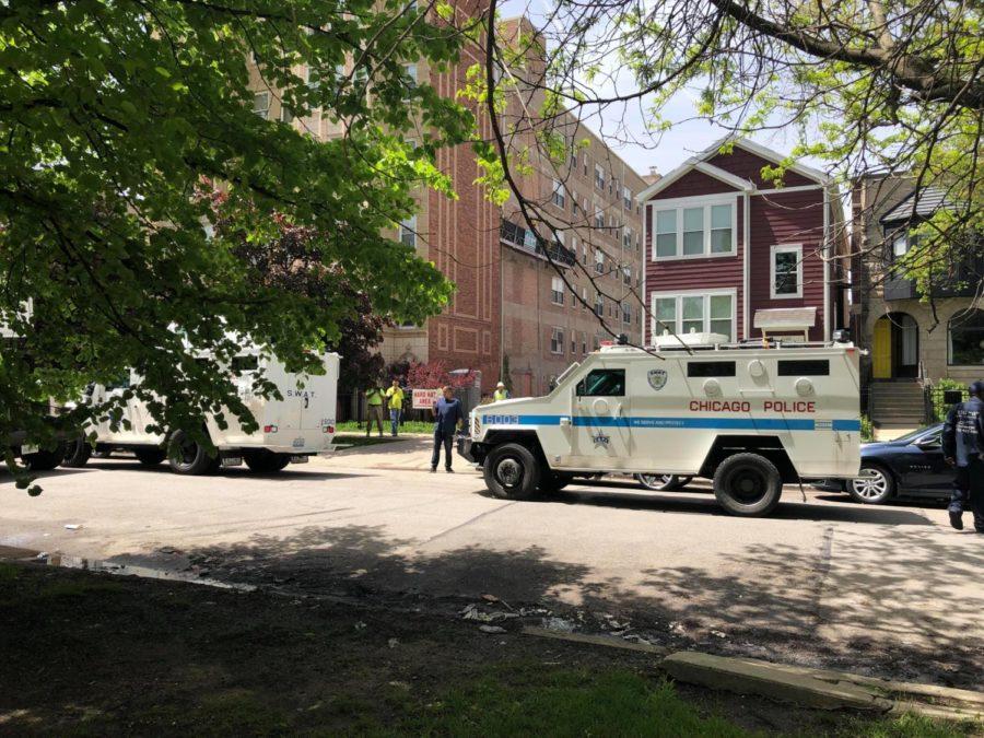 A SWAT car and a CPD car at East 61st Street and South Kenwood Avenue.