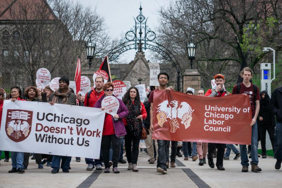 University of Chicago Labor Council and affiliated demonstrators march into the quad on May Day.