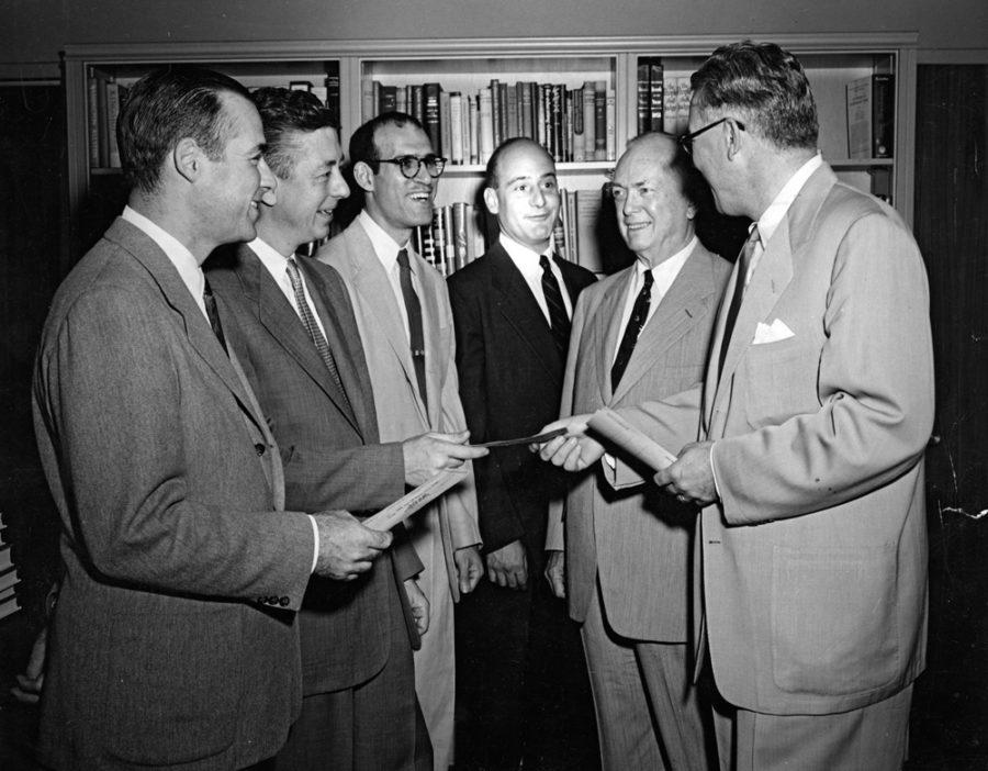 University of Chicago chancellor Lawrence A. Kimpton (far right) presents the Quantrell Award to members of the university faculty. Ernest E. Quantrell, university alumnus and trustee who founded the award, is second from right.