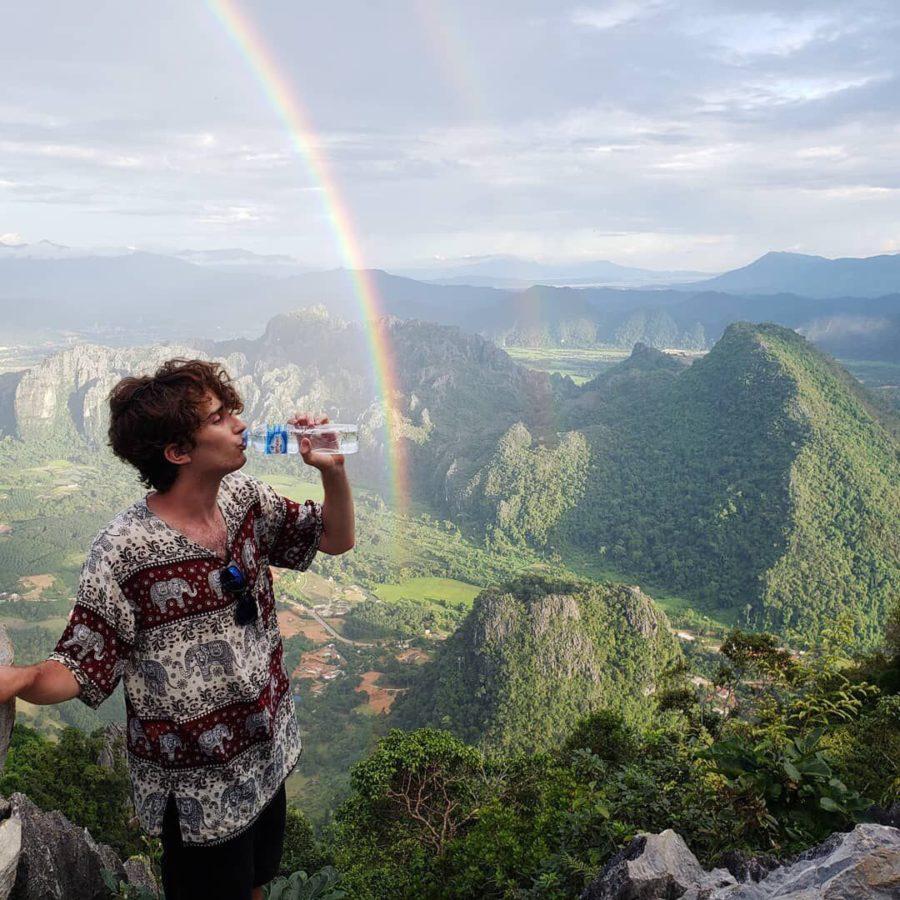 Fausett in Laos, where he died. This is the last picture he sent his family, his father Bret Fausett said. “He was reminding us that he was staying hydrated—but beside a double rainbow.”