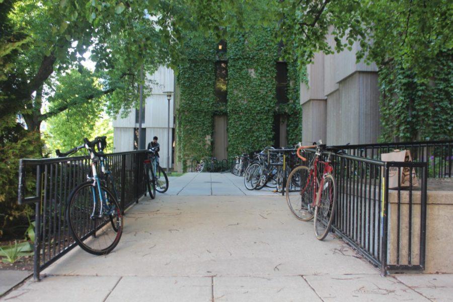 Bicycles locked to the railings of the Regenstein Librarys ramp present an obstacle for students using wheelchairs.
