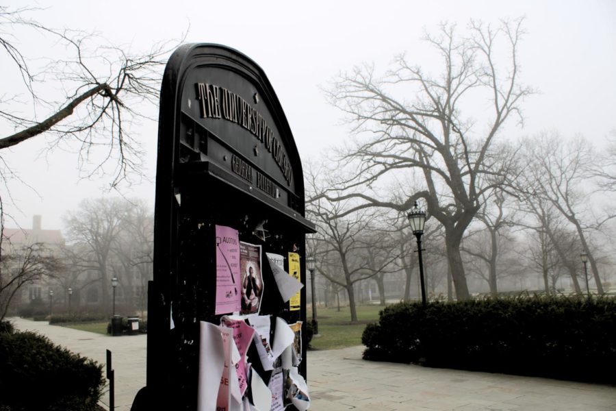 A bulletin board outside of Cobb Hall, on a misty day during spring break 2020, after many students had already left campus.