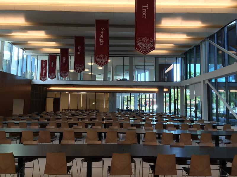 New house banners above house tables in Baker Dining Commons.